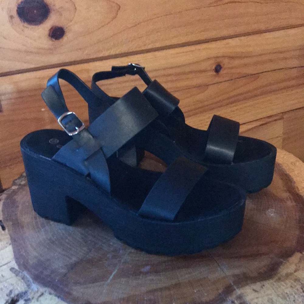 Never worn before!! Black platform heel!